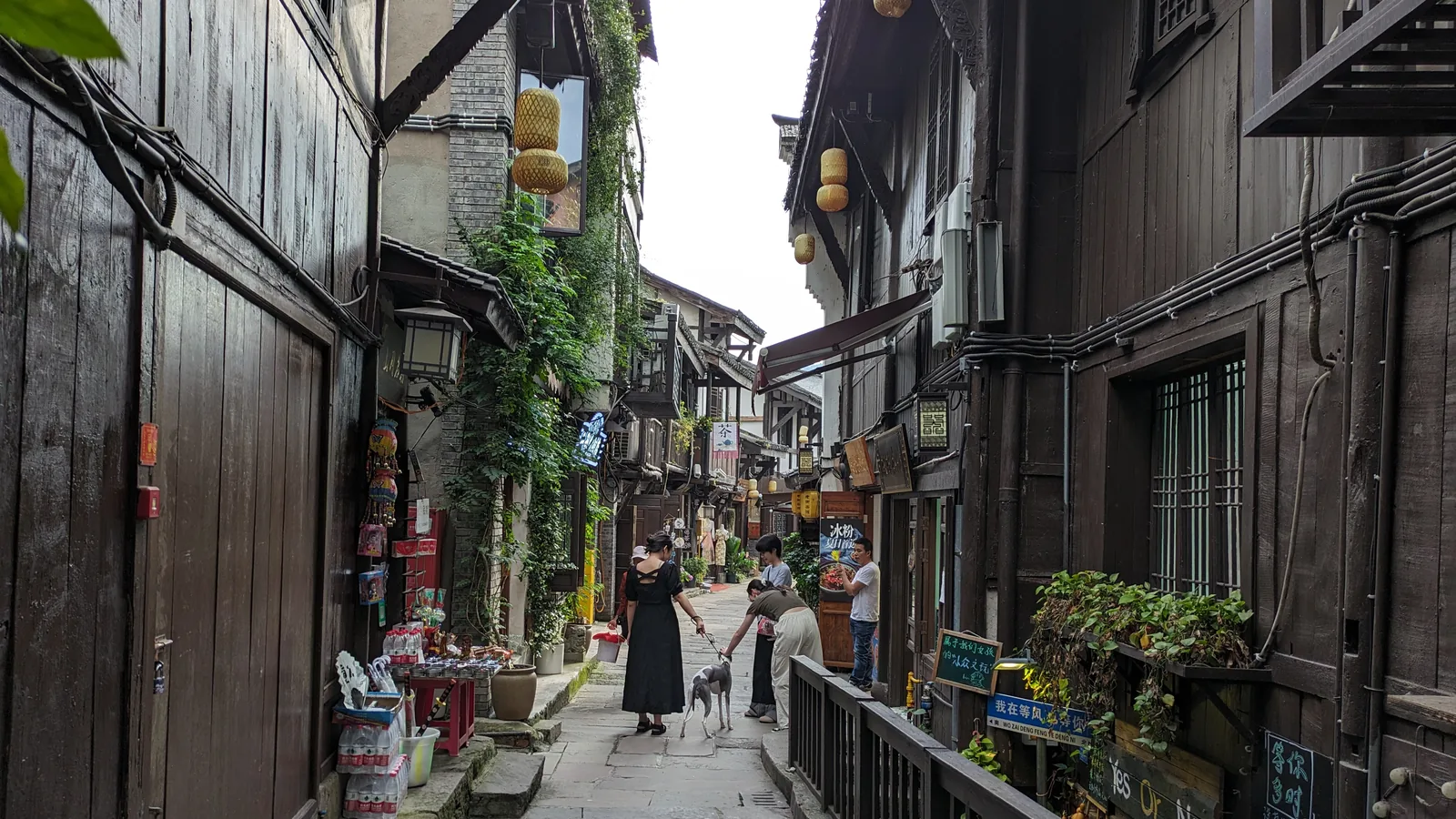 A narrow timber-fronted lane in Ciqikou Ancient Town, Chongqing