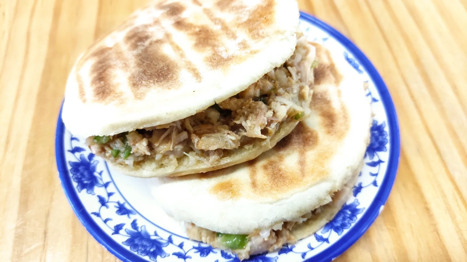 Traditional flatbread filled with chopped braised meat